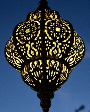 A beautifully carved wooden lamp showcasing intricate details.