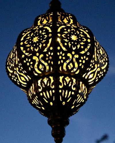 A beautifully designed table lamp showcasing intricate brass work.