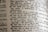 A close-up view of a dictionary page showing words and definitions related to 'diversion' and 'diversity'. The text is crisp with clear phonetic transcription and explanations in a serif font. The paper has a textured, off-white appearance, suggesting age or frequent use.
