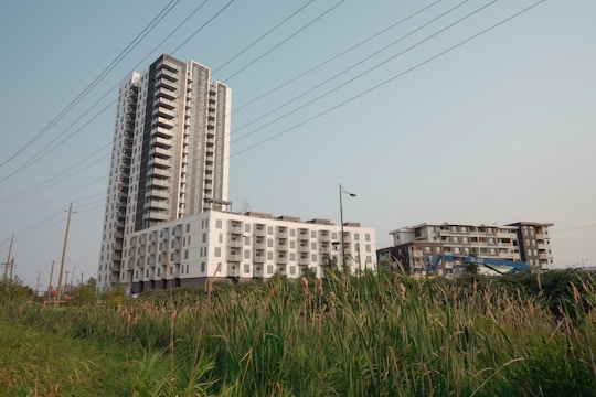 A modern apartment building in Mexico City with gas supply infrastructure visible.