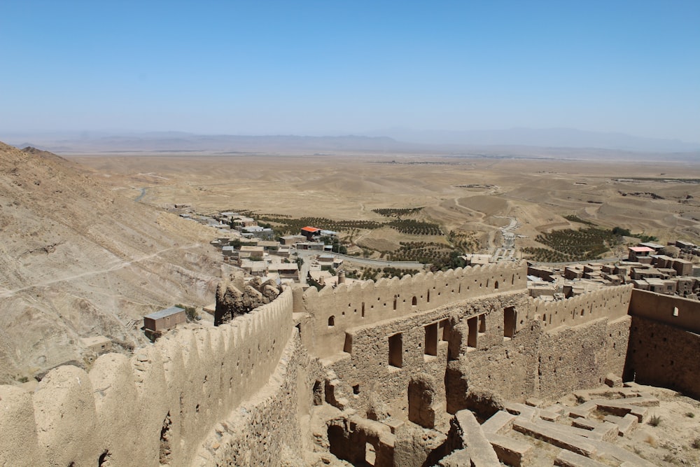 a view of a village in the middle of a desert