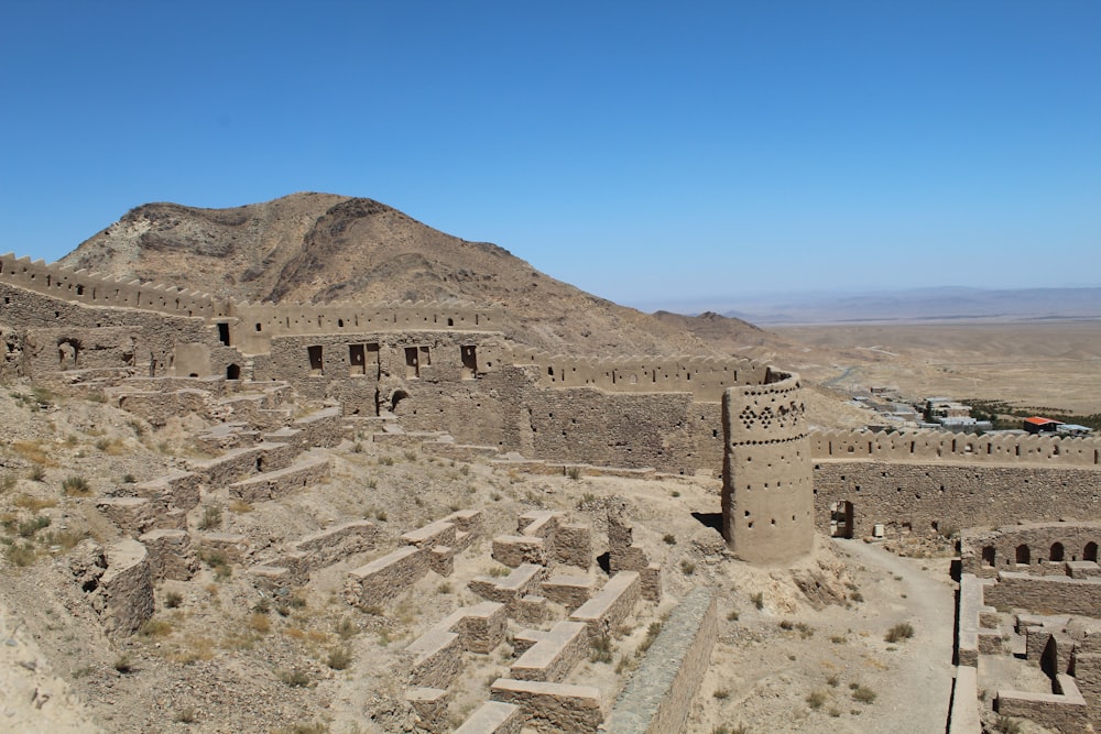 a large building in the middle of a desert