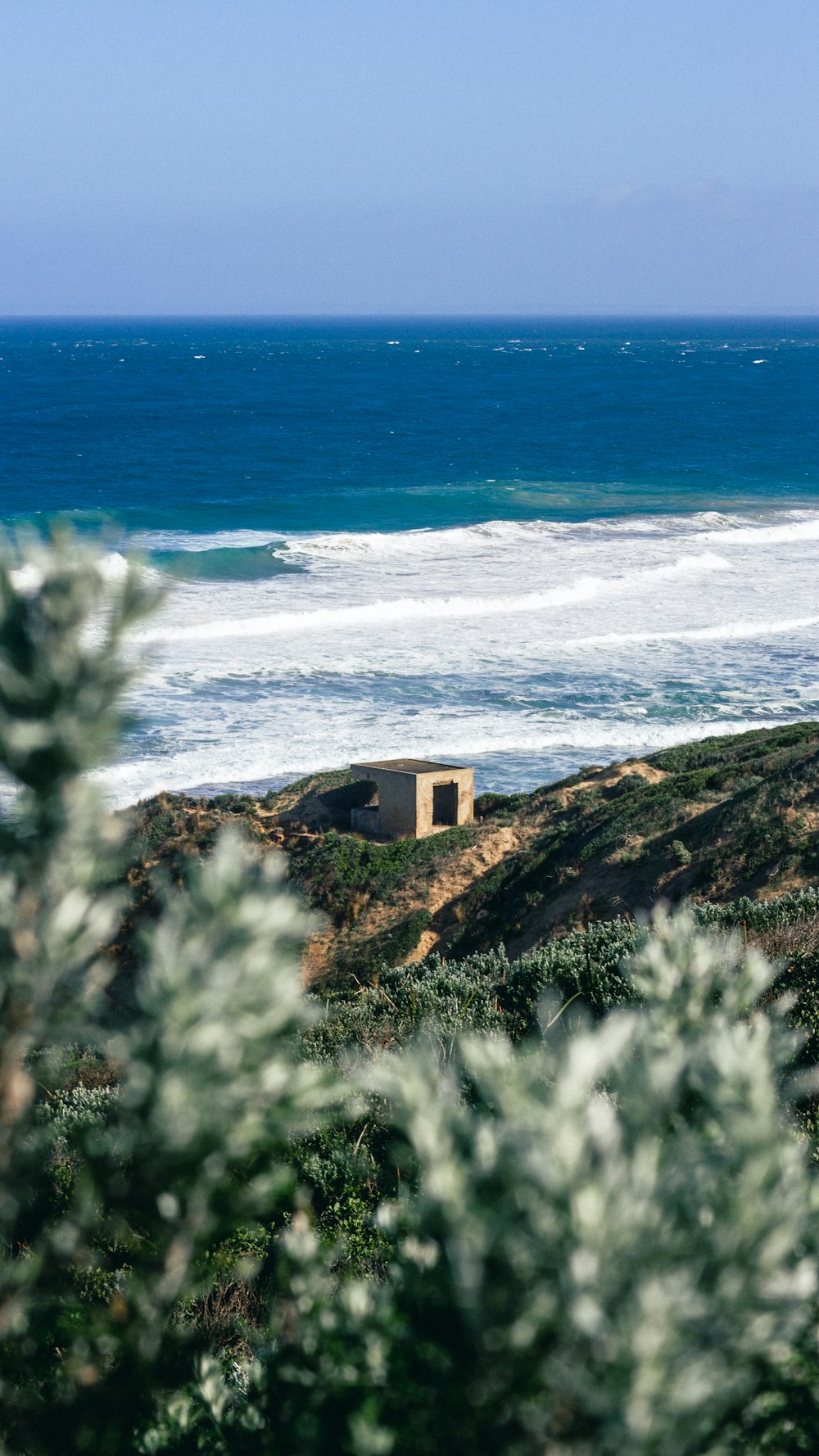 a view of a body of water from a hill