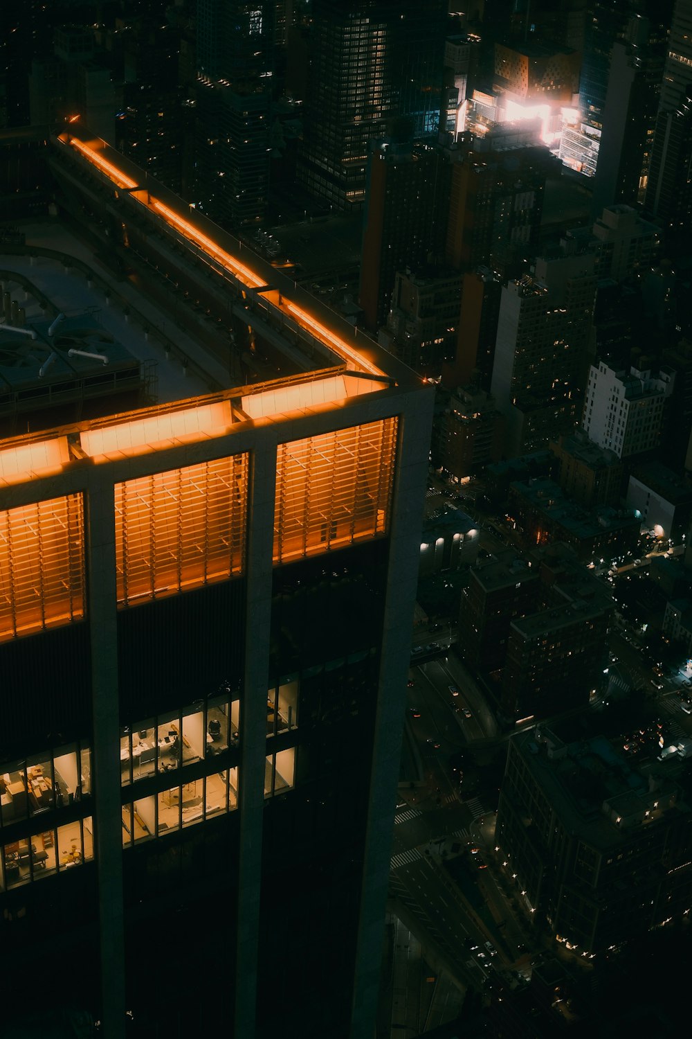 an aerial view of a city at night