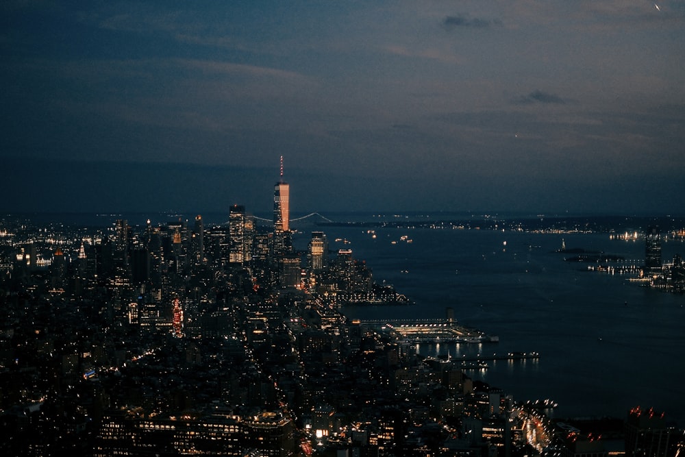 a view of a city at night from the top of a building