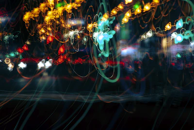 A whimsical snapshot of colorful light trails in motion during the night.