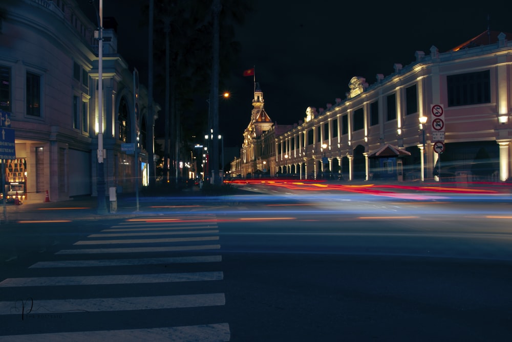 a blurry photo of a city street at night