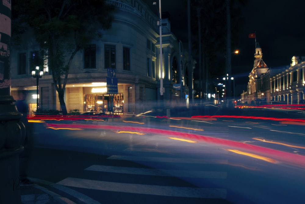 a blurry photo of a city street at night