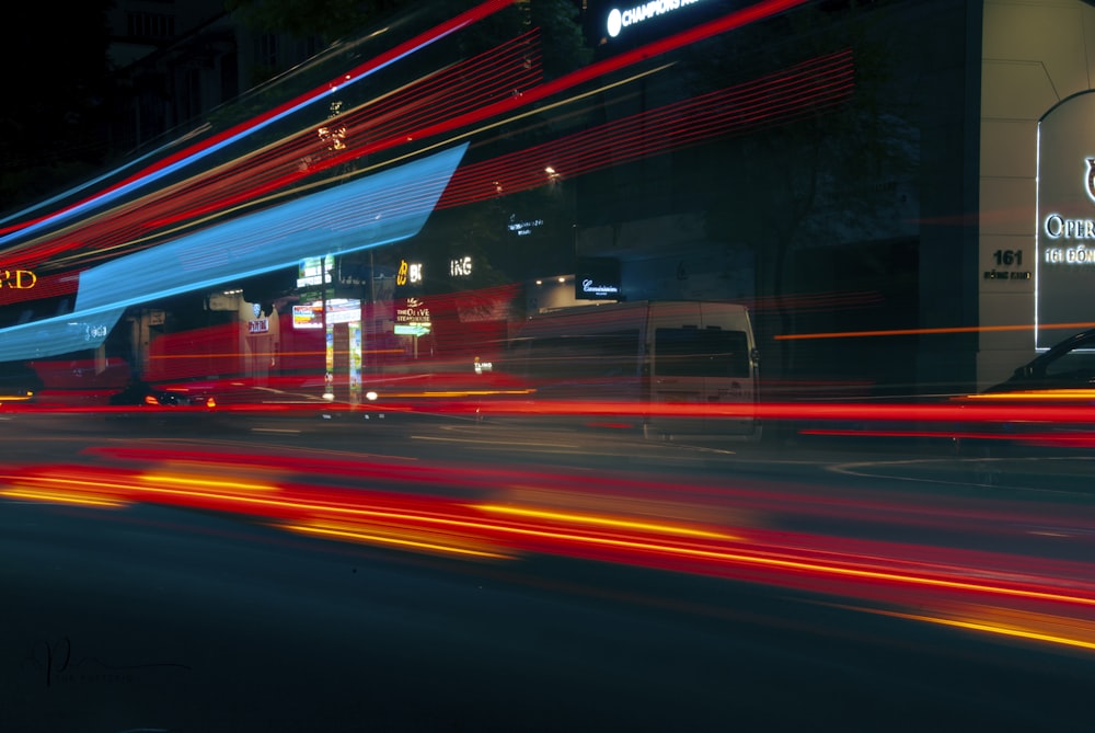 a blurry photo of a city street at night