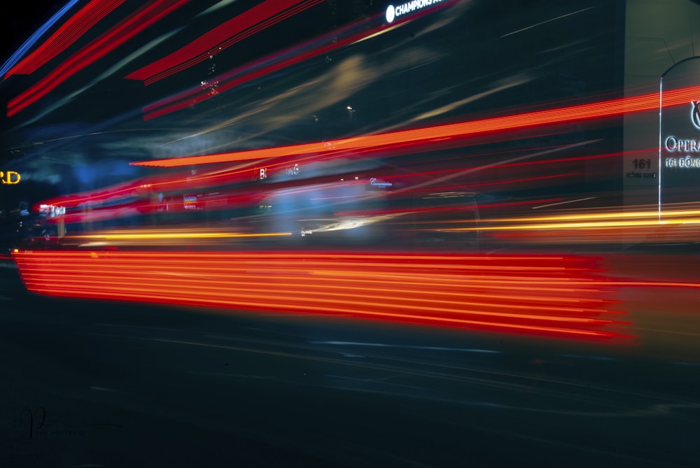 a blurry photo of a city street at night