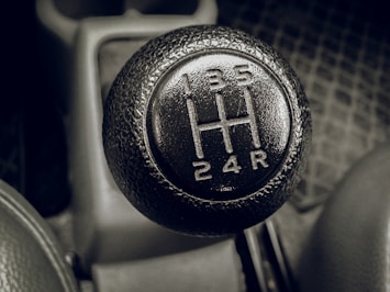 a close up of a car's gear stick