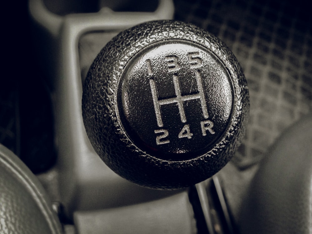 a close up of a car's gear stick