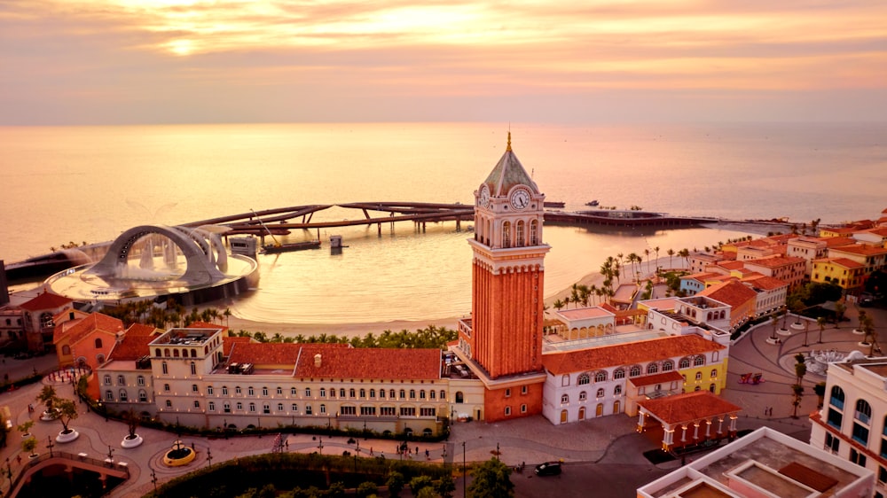 an aerial view of a city with a clock tower