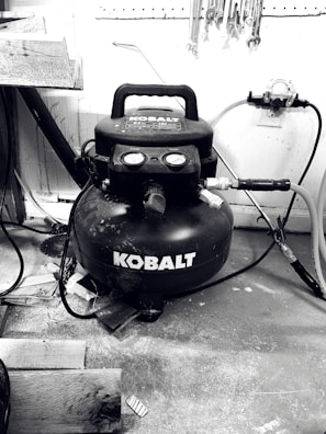 High-quality air compressor installed in an industrial workshop.