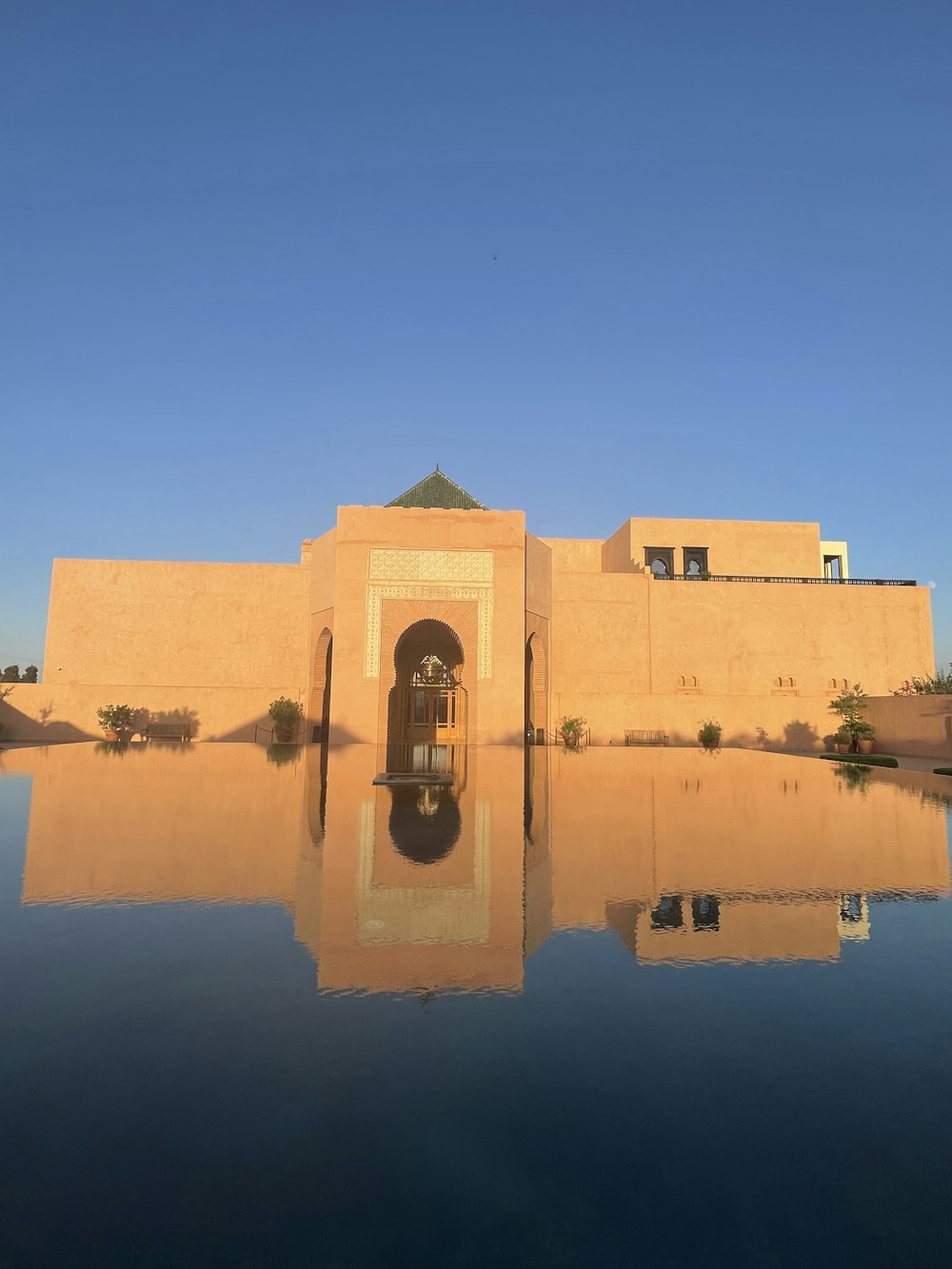 a building that is sitting in the middle of a body of water