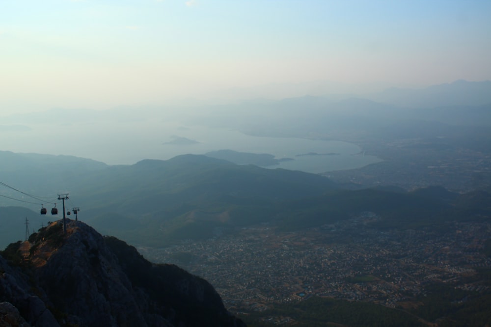 a view of a mountain with a cable car going over it