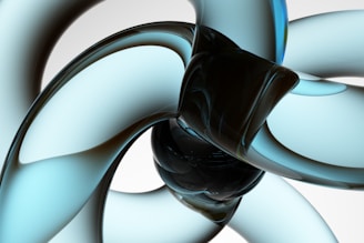 A close-up view of an abstract 3D design featuring smooth and flowing shapes with a glossy texture. The intertwining curves create a dynamic and intricate pattern, with a combination of light blue and black hues dominating the composition.