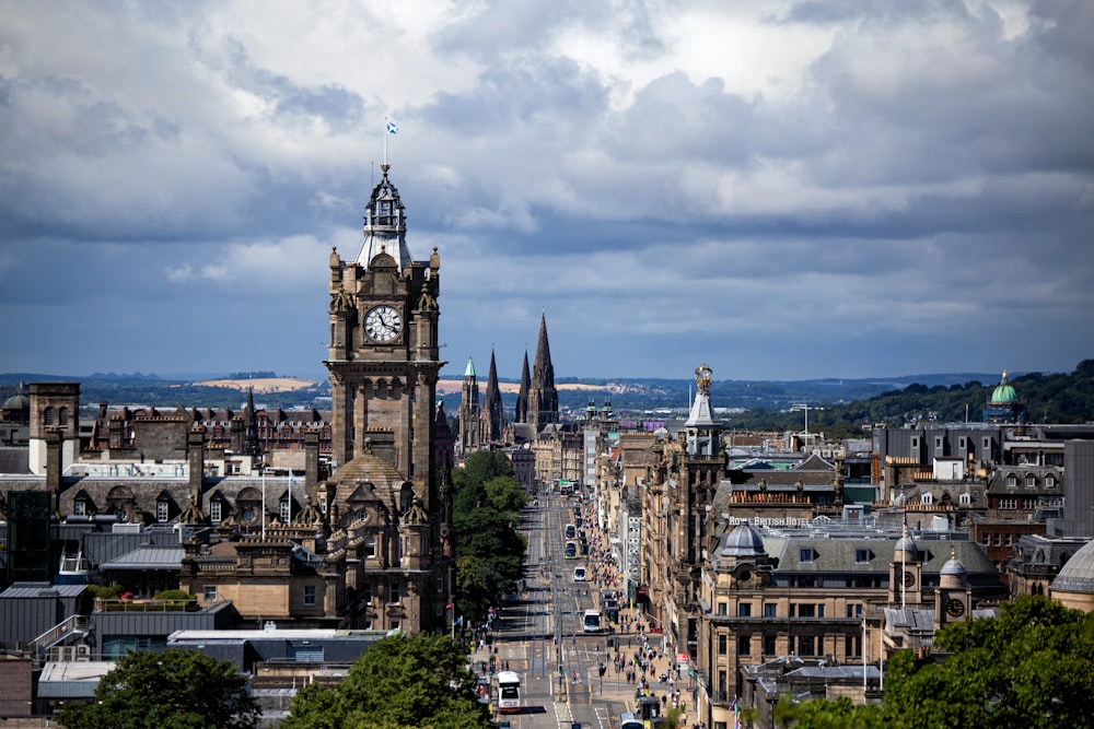 a large clock tower towering over a city