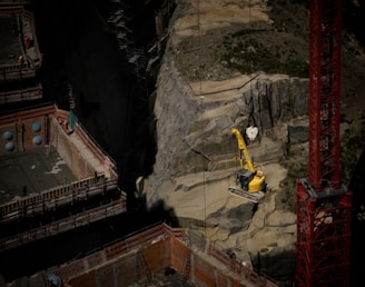 a construction site with a crane and construction equipment