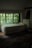 A cozy and welcoming homestay room in Yogyakarta.