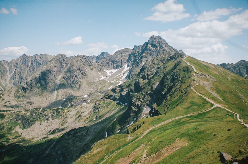 a view of a mountain range from a high altitude point