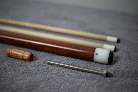 A collection of high-quality billiard cues.