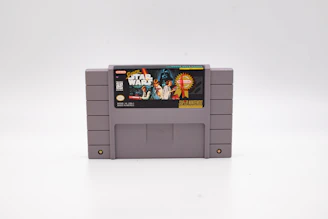 Stack of professionally packaged SNES cartridges with custom labels and retail boxes