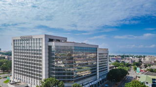 Commercial office space with glass facade in city center.