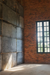 A bright classroom with students engaged in solving advanced math problems on whiteboards.
