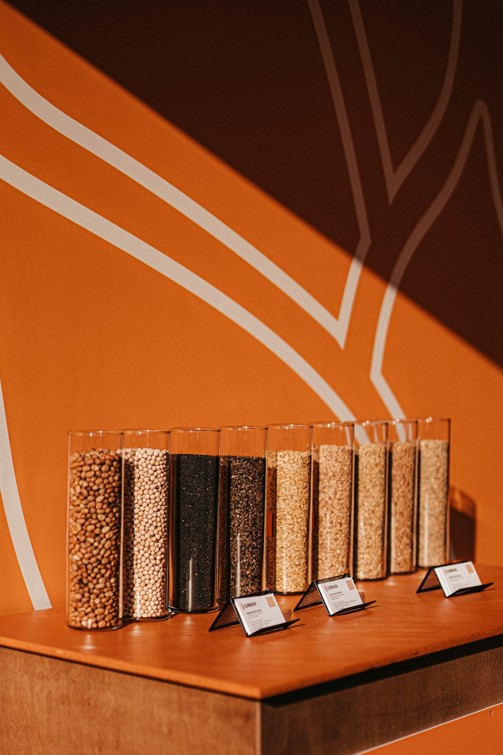 a shelf with a bunch of grains on top of it