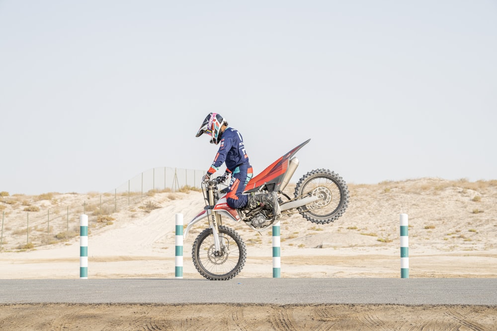 a person on a dirt bike doing a trick