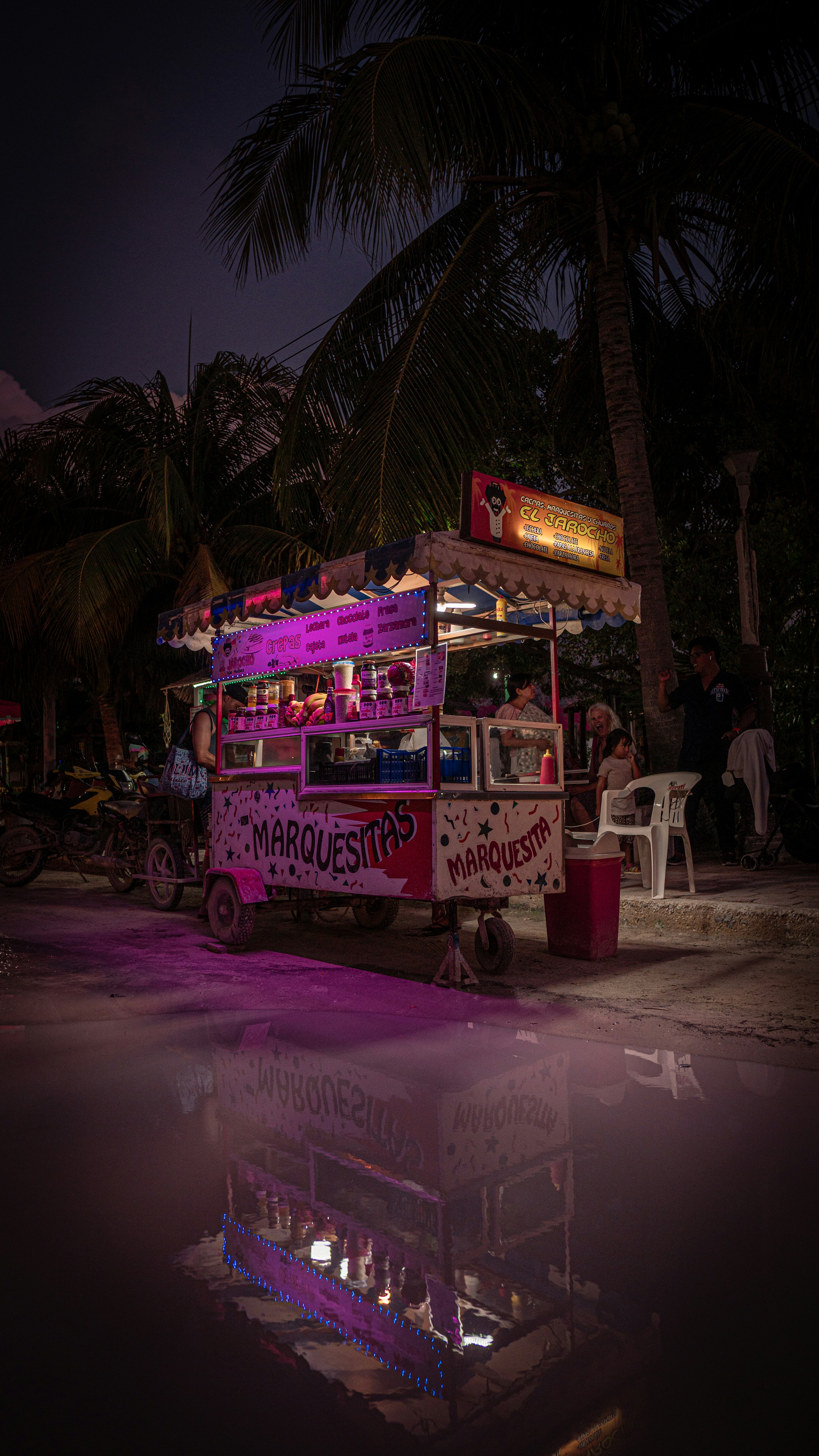 a food truck parked on the side of the road