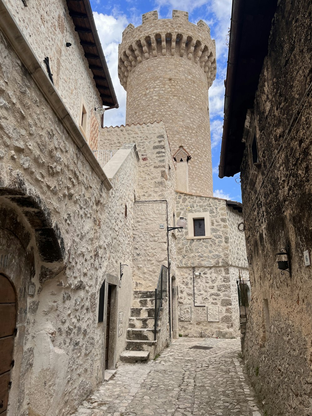 a stone building with a tower on top of it