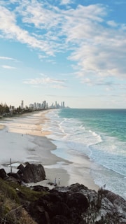 A scenic beach view inviting visitors to take advantage of a spontaneous travel deal.