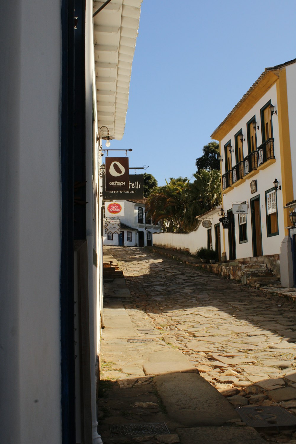 a cobblestone street in a small town