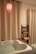A cozy and stylish bathroom with warm lighting and contemporary decor.