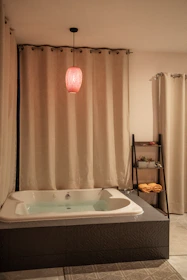 Cozy bathroom remodel featuring underfloor heating and ambient lighting in a Santander home.