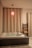 A cozy Turkish bath with steam rising and traditional tiles creating a tranquil atmosphere.