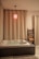 A cozy Turkish bath with steam rising and traditional tiles creating a tranquil atmosphere.