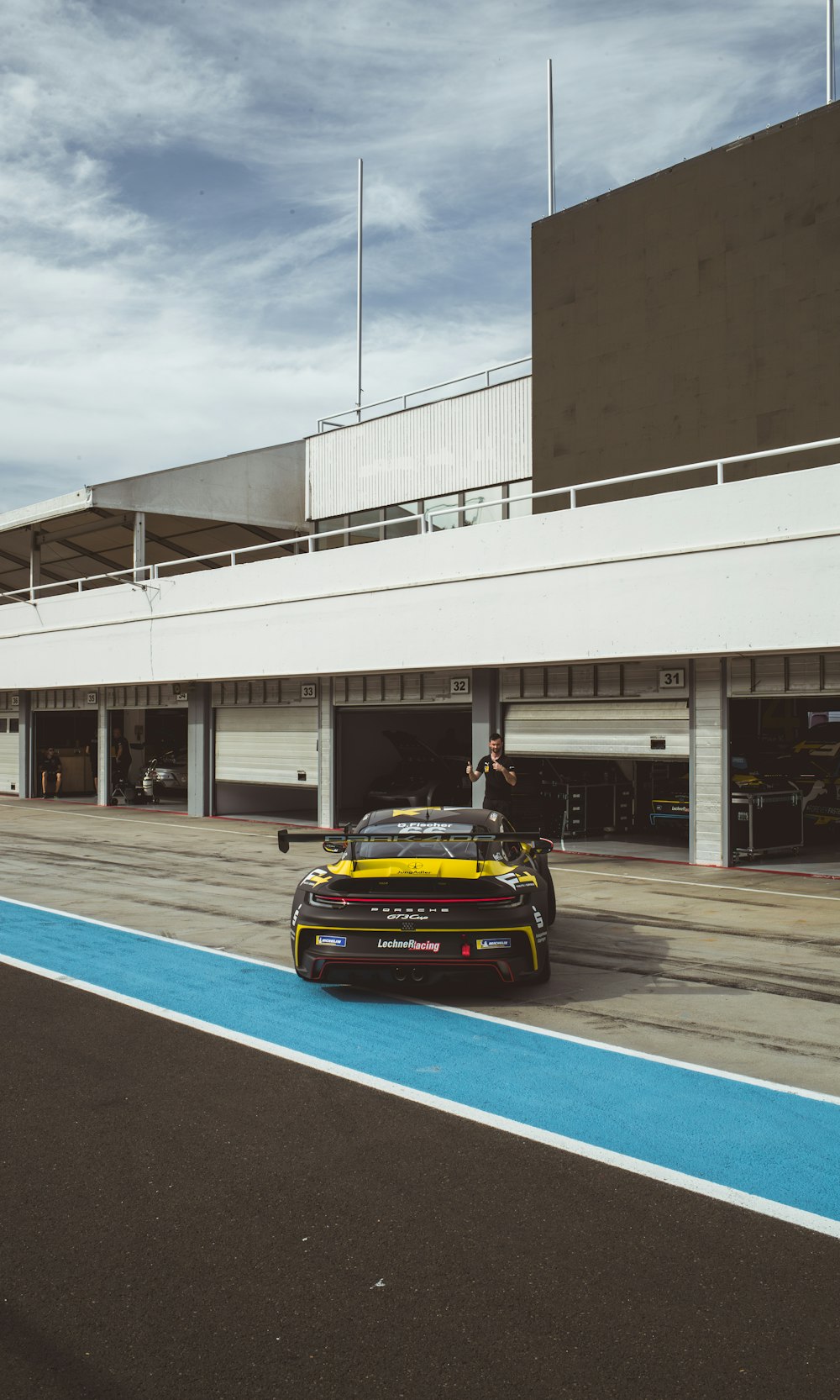 a race car driving down a race track