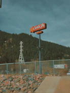 Still frame from the Paris Hilton x Carl's Jr. AI commercial showing a playful, retro-inspired scene.