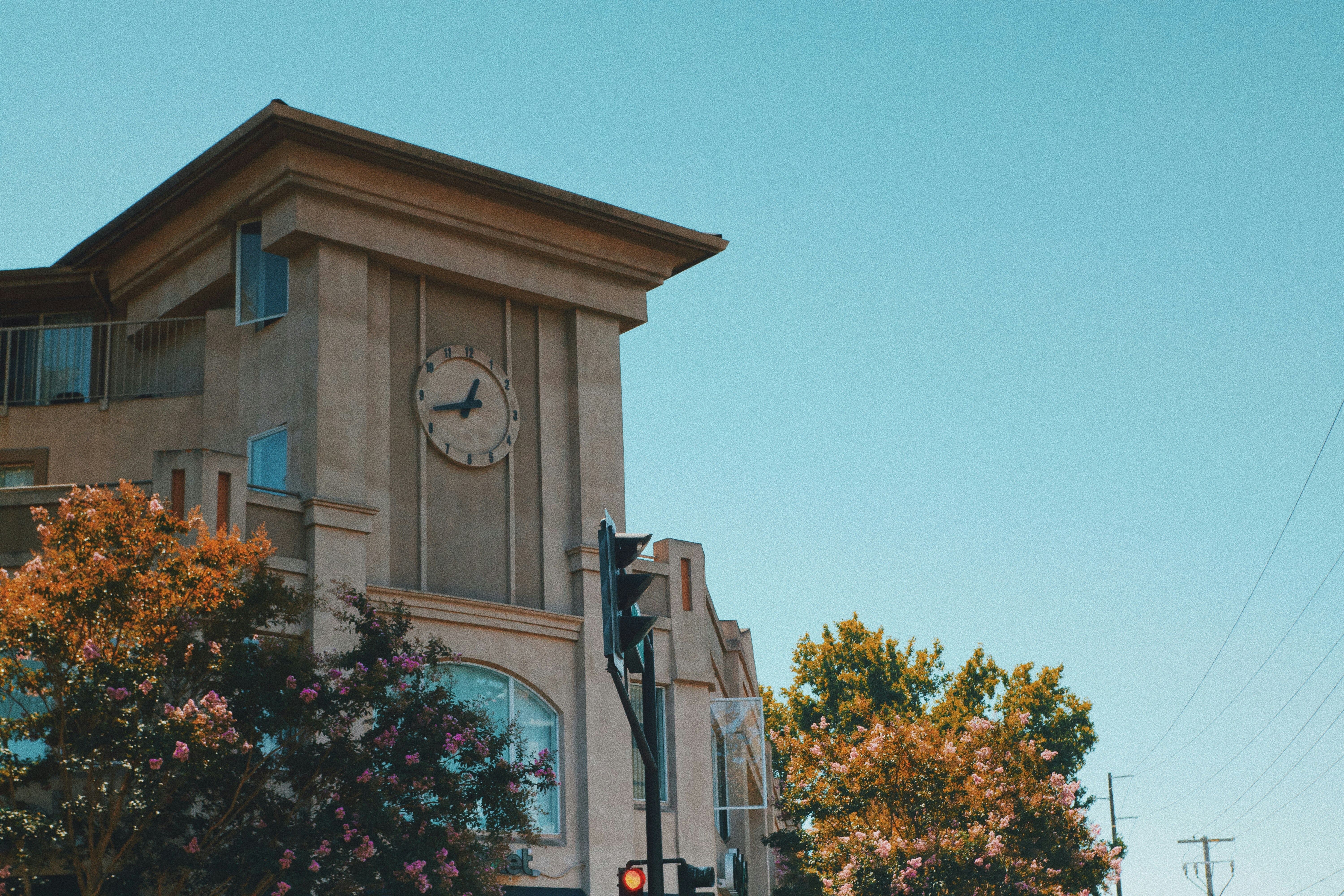 a clock tower on the side of a building
