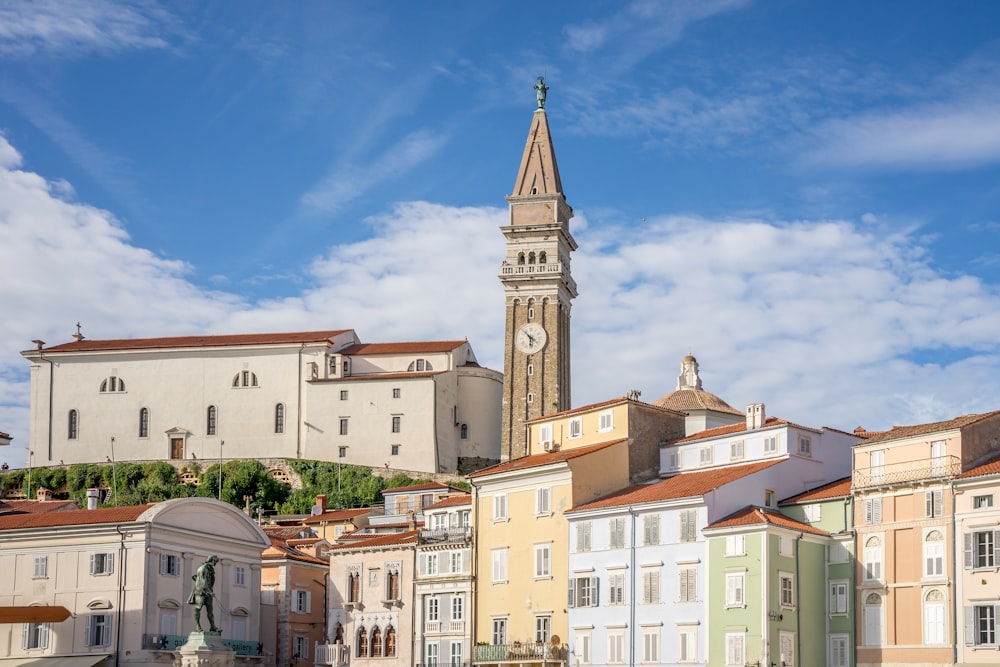 a large clock tower towering over a city