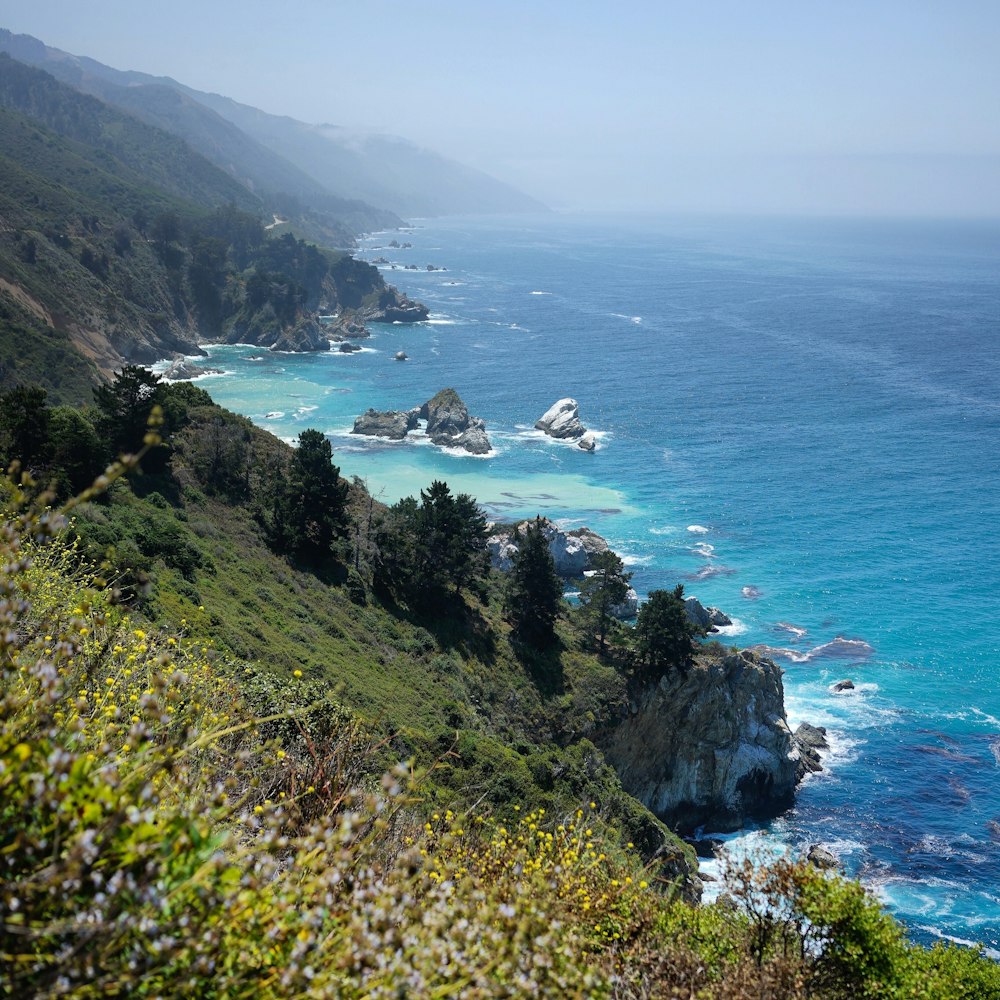 a scenic view of the ocean from a cliff