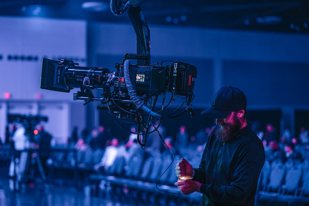 a man standing in front of a camera