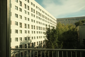 Apartment balcony view overlooking green park