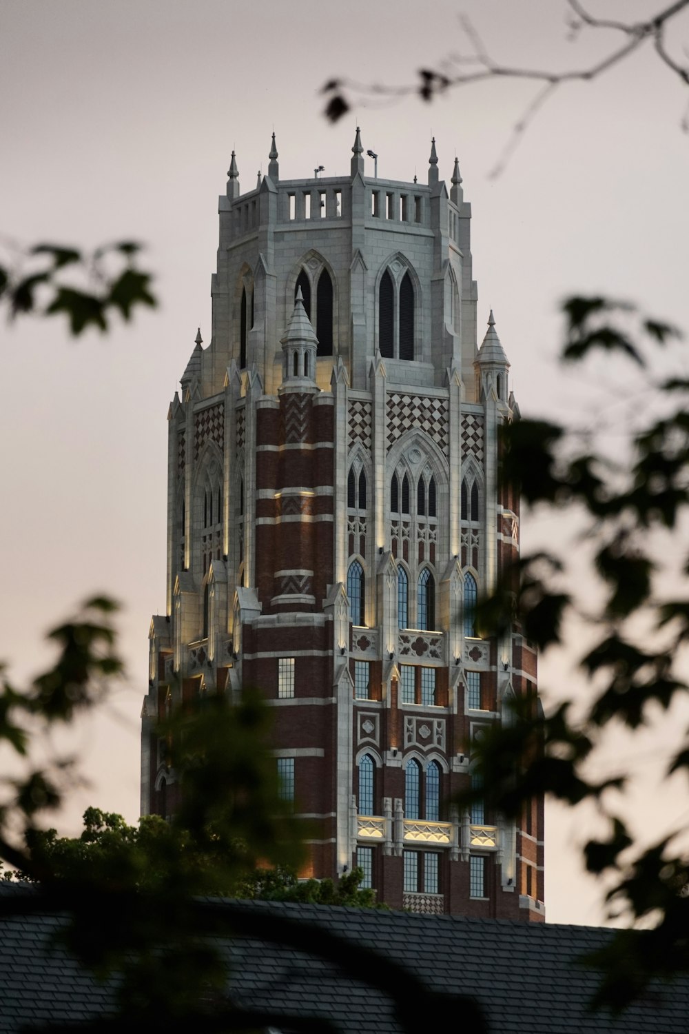 a very tall building with a clock on it's side