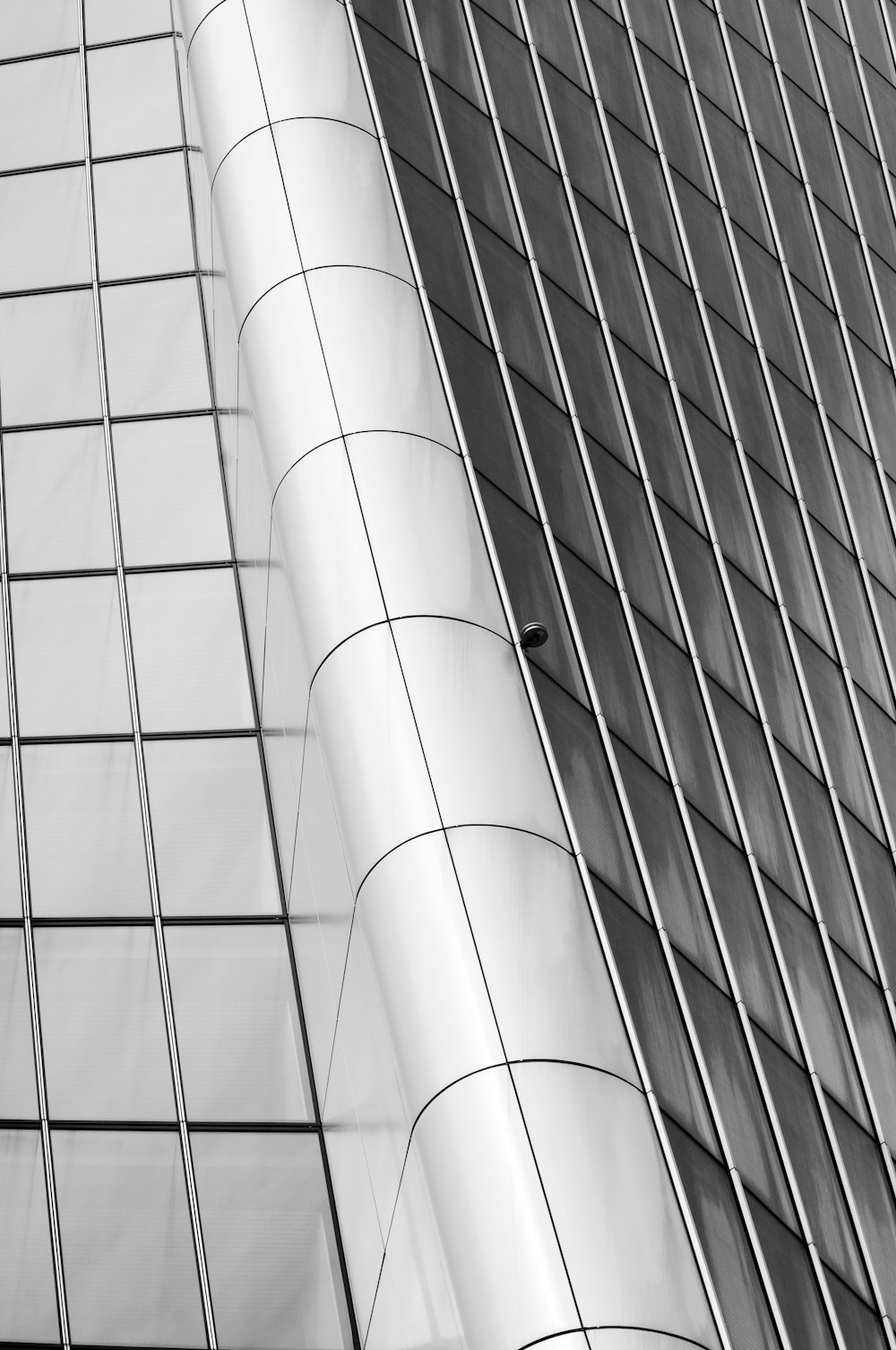 a black and white photo of a tall building