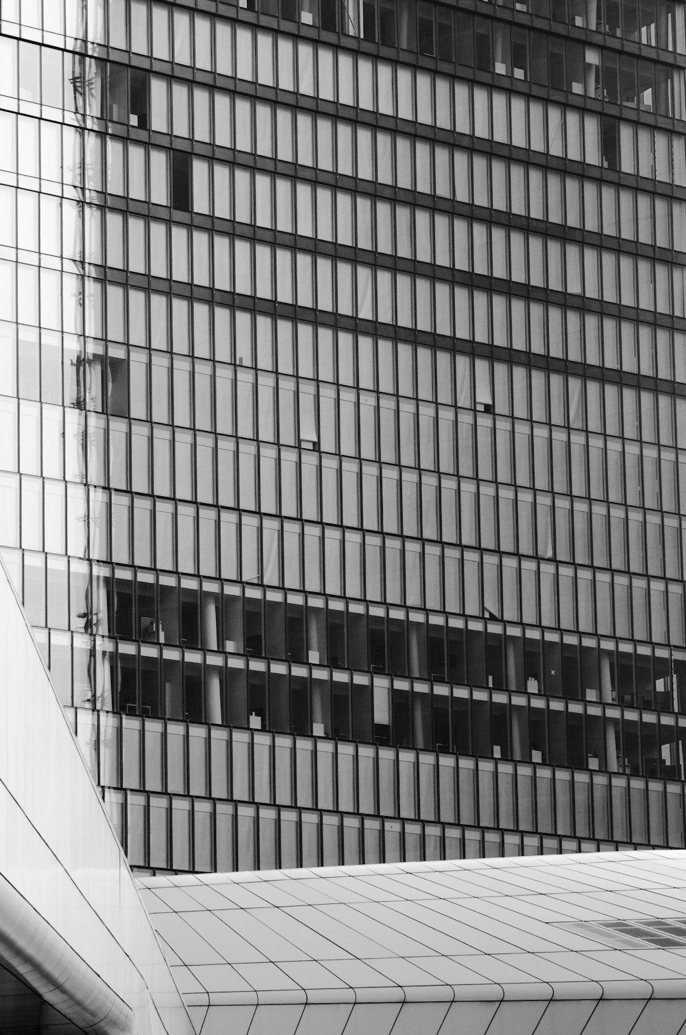 a black and white photo of a tall building