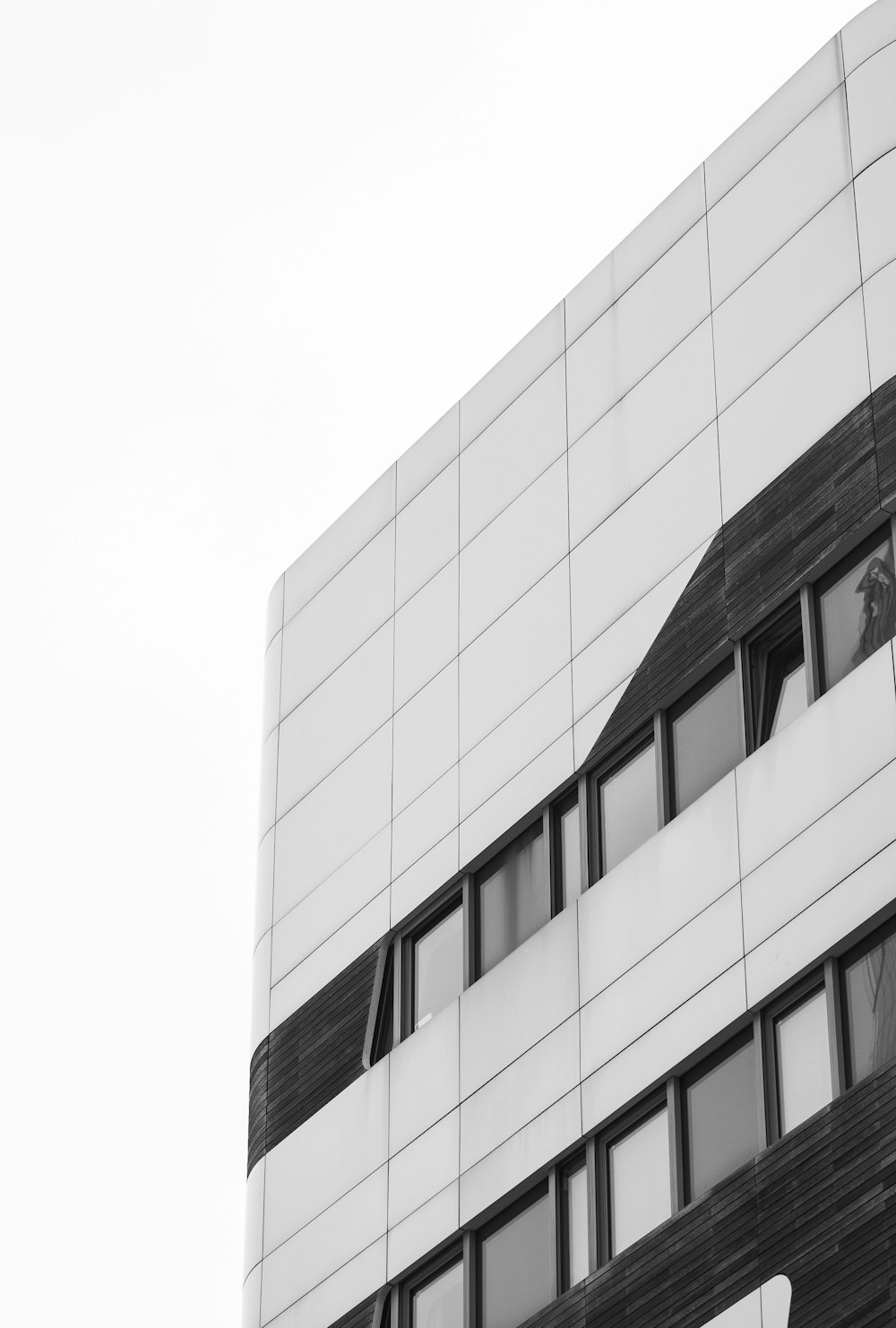 a black and white photo of a tall building